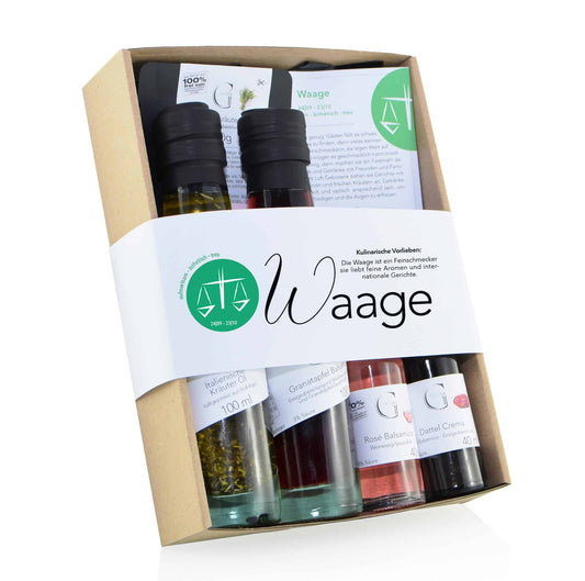 Hochwertige Geschenkbox Sternzeichen Waage von Genial Genießen mit fünf fein abgestimmten Öl-, Essig- und Gewürzspezialitäten für alle, die zwischen dem 24. September und 23. Oktober geboren sind.
