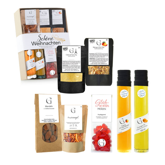 Festliches Weihnachts-Geschenkset von Genial Genießen mit hochwertigen Delikatessen und Genussprodukten, liebevoll verpackt für besondere Genussmomente an den Feiertagen.
