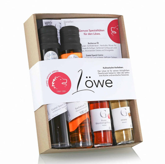 Hochwertige Geschenkbox Sternzeichen Löwe von Genial Genießen mit fünf fein abgestimmten Genussprodukten wie Würzölen, Balsamico und Dip-Gewürz für alle, die zwischen dem 23. Juli und 23. August geboren sind.