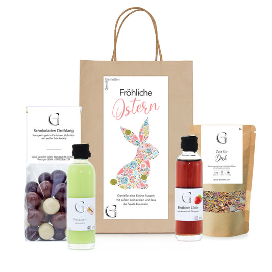 Fröhliche Ostern Geschenktüte von Genial Genießen mit Granatapfel Balsam, Mango Crema, Lieblingsbären Fruchtgummis und Kräutertee in Osterverpackung