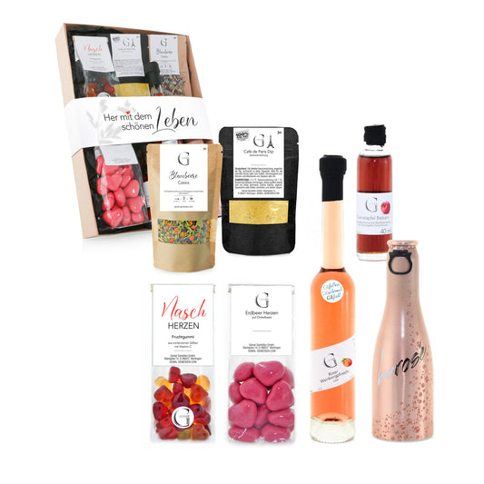 Hochwertige Geschenkbox von Genial Genießen mit Blaubeer-Cassis Tee, Granatapfel Balsam, Weinbergpfirsich Likör und süßen Spezialitäten