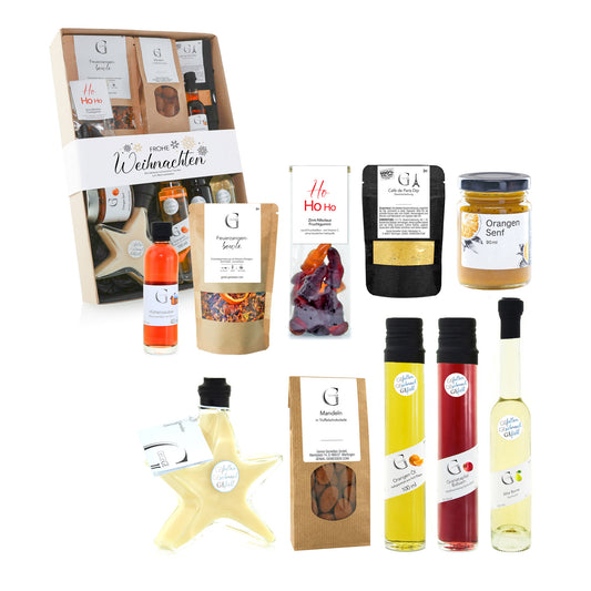 Festliches Genial Genießen Geschenkset „Frohe Weihnachten“ mit hochwertigen Genussprodukten und liebevoll arrangierten Delikatessen für die Advents- und Weihnachtszeit.