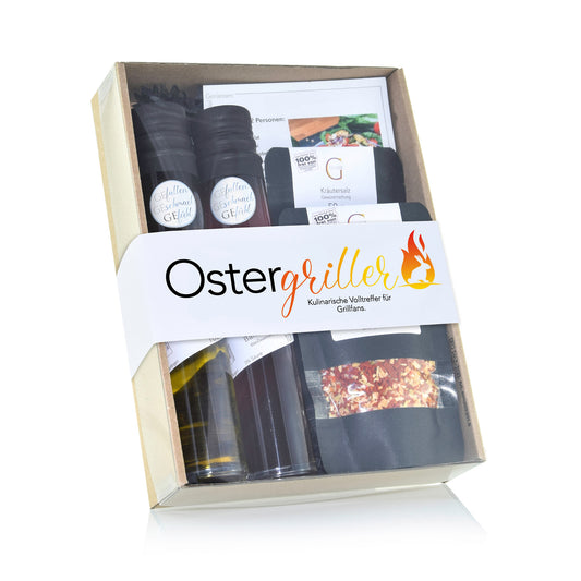 Genial Genießen Ostergriller Geschenkset mit ausgewählten Grill- und Feinkostspezialitäten wie Barbecue-Öl, Bier Balsam, Kräutersalz und Dip-Gewürzen in dekorativer Geschenkverpackung für genussvolle Ostergrillmomente.