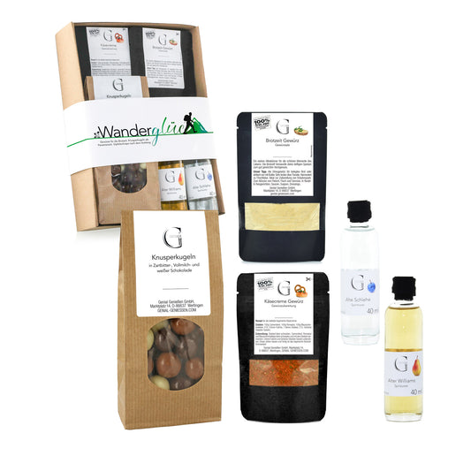 Hochwertiges Wander-Geschenkset von Genial Genießen mit liebevoll zusammengestellten Delikatessen für Naturfreunde und Bergliebhaber.