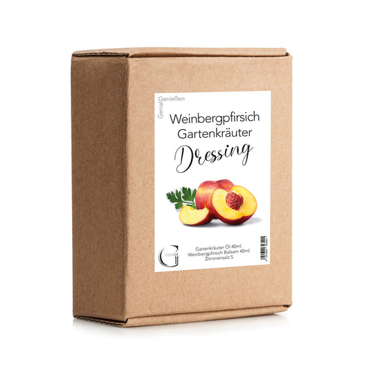 Genial Genießen Weinbergpfirsich & Gartenkräuter Dressing-Set in dekorativer Geschenkverpackung mit fruchtigem Weinbergpfirsich, aromatischen Gartenkräutern und ausgewählten Feinkostzutaten für besondere Salatkreationen.
